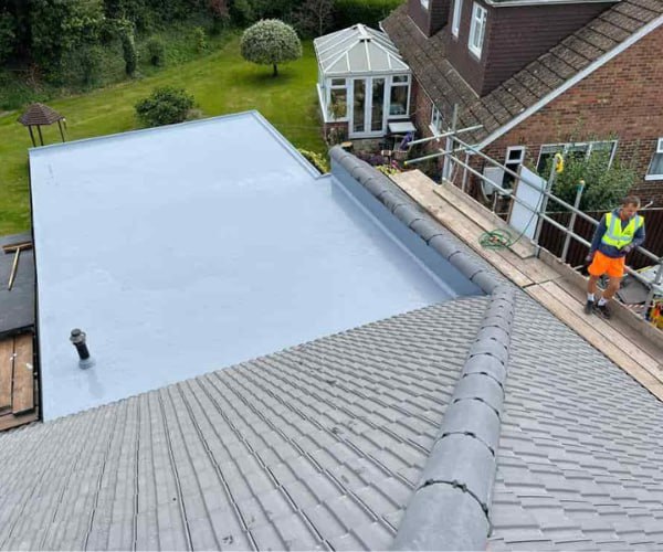 This is a photo of a newly installed hip roof, with a combined liquid covered flat roof. Work carried out by HJT Roofing Gainsborough