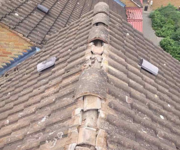 This is a photo if a roof ridge which has missing tiles. The ridge tiles are being replaced by HJT Roofing Gainsborough